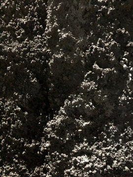 Rough grey concrete texture, macro sand cement mix surface background