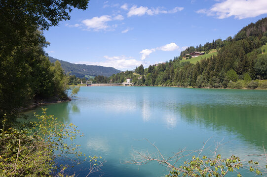 If you look out over Lake Valdaora in South Tyrol, you can see its dam at the far end.