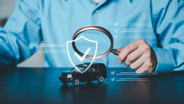 Insurance protection concept, accident insurance, policy verification, risk management, coverage, protection, claims and financial security. Magnifying glass over a shield and vehicle.