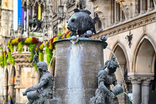 Fischbrunnen Fish Fountain at Marienplatz with New Town Hall in Munich Germany
