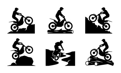 Fototapeta premium Black silhouettes of motorcyclists performing extreme stunts on bikes
