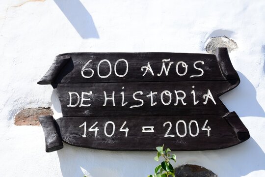 Sign on the front of the town hall saying 600 years of history old Calle Juan Bethancourt in the old town, Betancuria, Fuerteventura, Canary Islands, Spain, Europe.