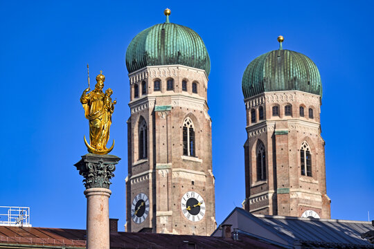 Mariensaeule Column and Frauenkirche Cathedral Towers in Munich Germany