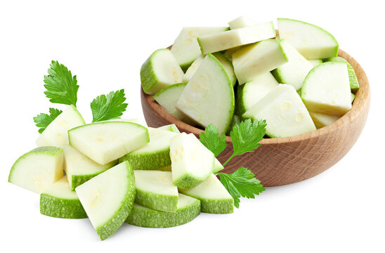 sliced fresh green zucchini or marrow isolated on white background. clipping path