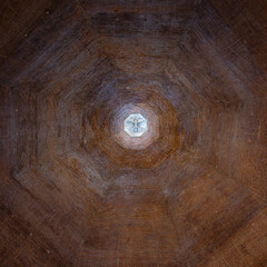 Octagonal brick dome with spiritual figure in Cremona, Italy © Michael Niehaus