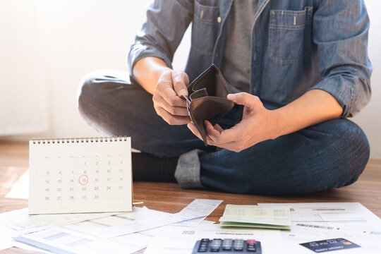 Stressed, Problem people asian woman hand holding and open an empty wallet not have money, credit card, not to payment bill, loan or expense in pay. Bankruptcy, bankrupt and debt financial concept.