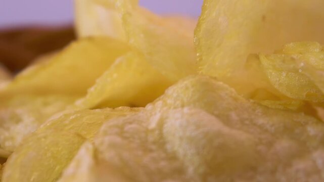 Thin Potato Chips Showing Curved Edges and Thickness, Macro View