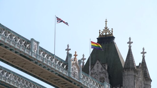 Union Jack waving on Tower Bridge in London, United Kingdom
