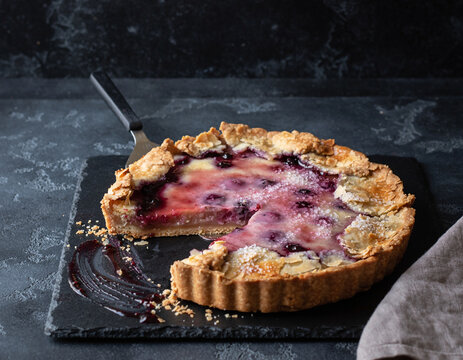 Rustic Homemade Mixed Berry Galette Tart on Dark Slate Board