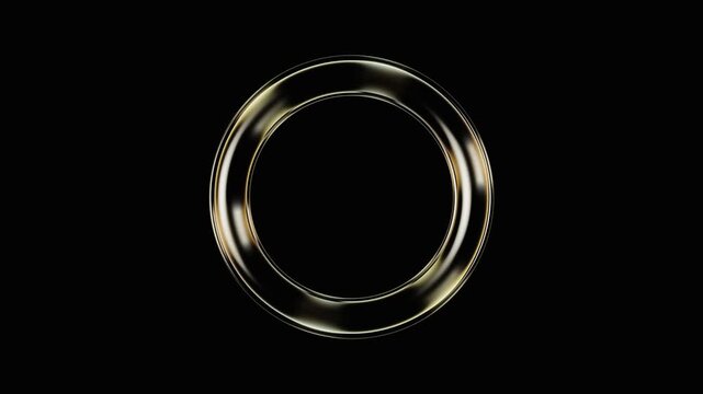 Golden metallic ring spinning against a black background. 4K Video
