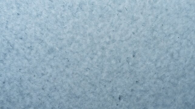 Macro view of light blue fibrous material, textured surface of synthetic fabric or insulation, soft abstract pattern