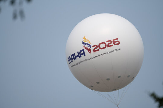 Promotional tethered white blimp balloon displaying the MAHA 2026 logo during an agricultural exhibition on September 14, 2026 in Selangor, Malaysia.   