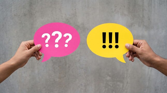 Colorful speech bubbles with question marks and exclamation points, hands holding pink and yellow paper icons, communication concept