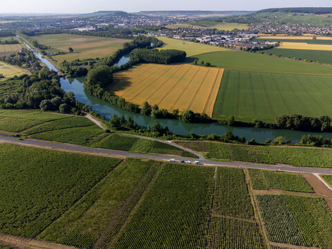 Aerial view, Cumieres and Hautvillers champagne vineyards in Marne Valley with rolling green hills, chalk terroir, summer landscape, traditional methode champenoise production.