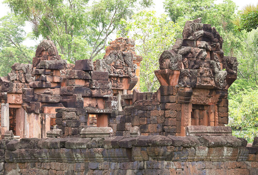 Close-up of the ancient stone carvings and lintel architecture at Prasat Peuai Noi, Khon Kaen, Thailand