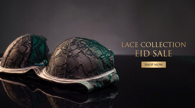 Elegant Black Lace Bra with Intricate Detail on Dark Reflective Surface during Sale Event