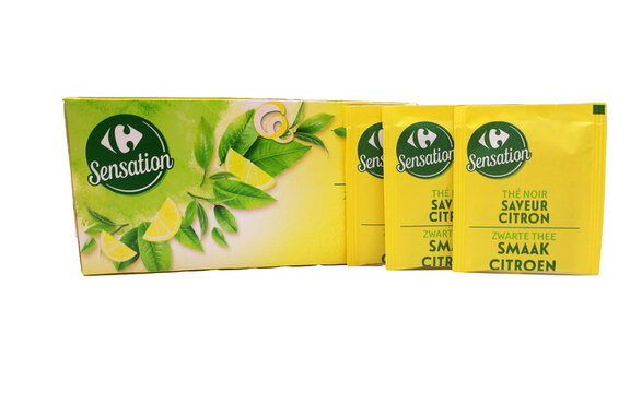 Boite et sachets de th&eacute; noir saveur citron de carrefour