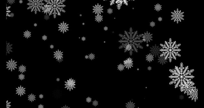 White snowflakes drifting down on a plain black background snow winter falling cold christmas