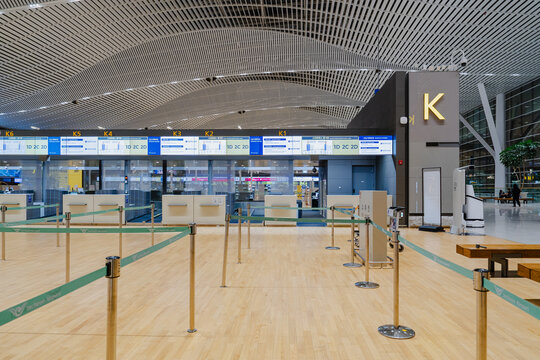 September 11, 2026, Incheon, South Korea - Empty check-in counters K1 to K6 with queue barriers at Incheon International Airport Terminal 2.