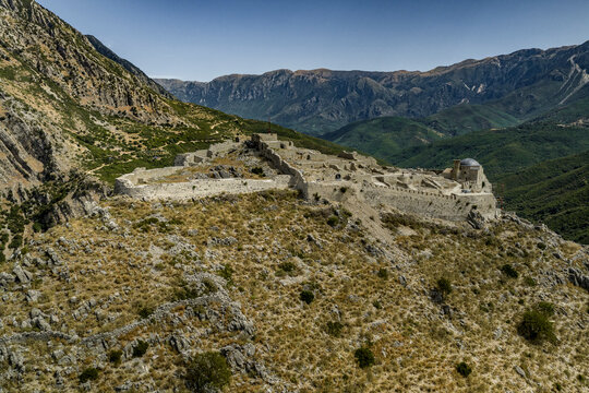 Borsh Fortress, Fortified Stone Complex on a Rugged Mountain Ridge with Domed Building