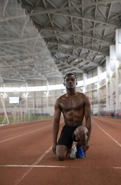 African American sportsman on track before race