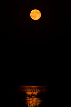FULL MOON REFLECTED ON A LAGOON