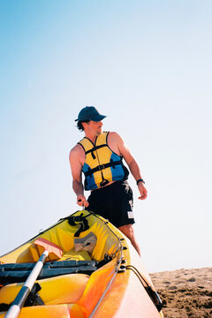 Man With Beach Kayak