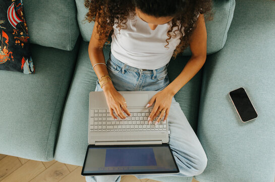 Woman Typing Laptop Overhead View