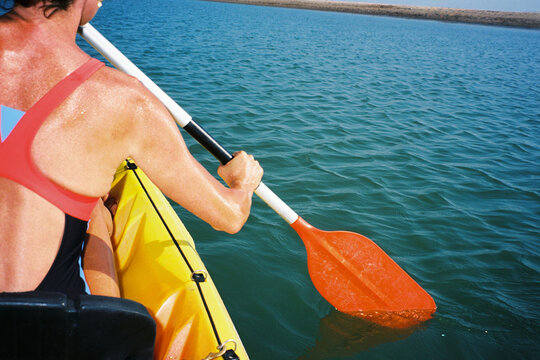 Kayaking Across Blue Water