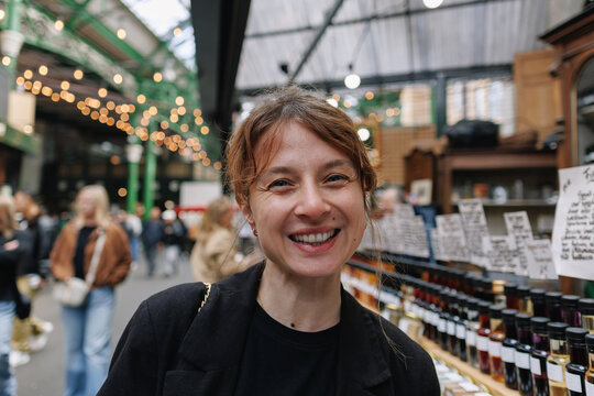 Woman smiling at Borough Market London