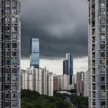 City Skyline Under Dark Clouds in an Urban Area
