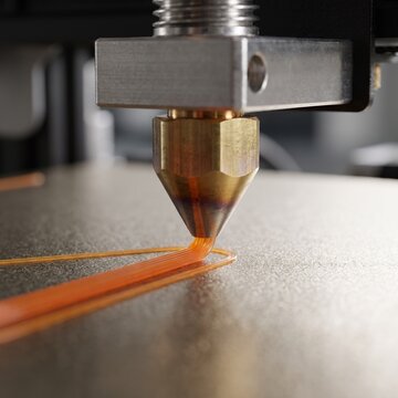Industrial 3D printer nozzle extruding orange filament, additive manufacturing process, precision engineering and rapid prototyping technology