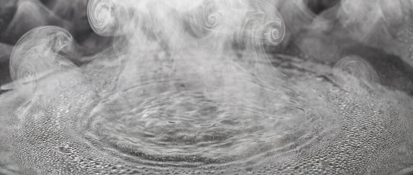 Steam vapor rising from boiling hot water texture. Abstract liquid smoke background