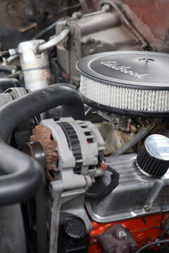 Close-up of V8 Car Engine with Round Air Cleaner and Alternator