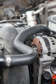 Close-up of V8 Car Engine with Round Air Cleaner and Alternator