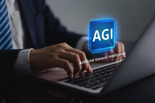 Artificial general intelligence AGI interface on laptop with business user typing for emerging AI research and enterprise technology concept