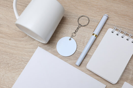 Corporate identity, set of white blank promotional products for business on table. Flat lay. Creative mockup for your brand design.