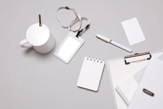 Corporate identity, set of white blank promotional products for business on a gray background. Flat lay. Creative mockup for your brand design.