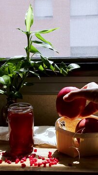 Celebrating Rosh Hashanah with apple, honey, and pomegranate