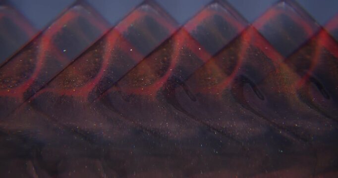 Blur glitter paint. Color light. Purple blue orange blend texture shiny fluid floating on abstract optical creative art background.