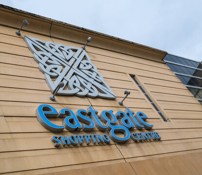 Eastgate Shopping Centre exterior facade and entrance in Inverness located in the Highlands of Scotland during a bright and cloudy daytime setting