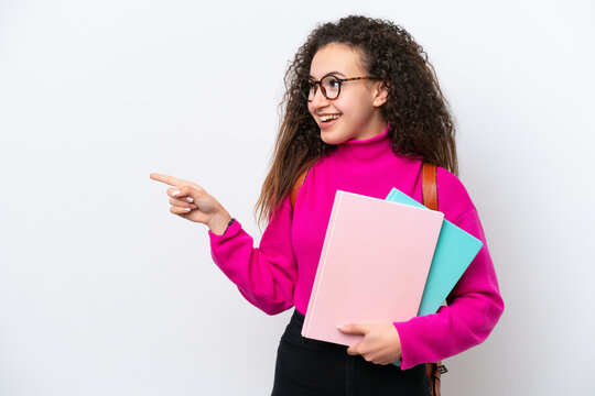 Young student Arab woman isolated on white background pointing finger to the side and presenting a product