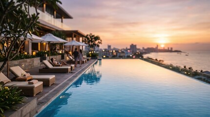 Fototapeta premium Luxury resort guests relaxing by infinity pool during golden hour sunset