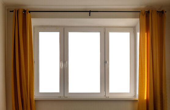 Minimalist empty window mockup with warm curtains and blank white panes; designed as a versatile template for inserting images; graphics; landscapes; or other visual content.