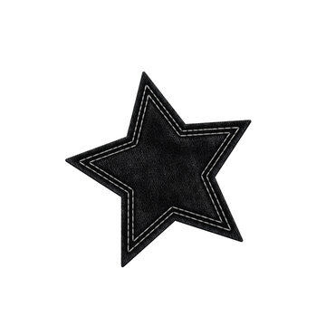 Black denim star patch with white stitching in decorative sewing craft and fashion accessory.