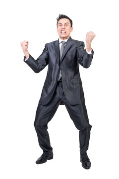 Full body of angry male in classy suit shouting and making face on transparent background