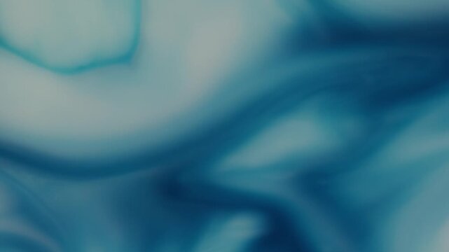 Abstract dark metallic wave motion graphic loop with reflective silver light creating seamless liquid silk ripples for elegant screensaver background design.