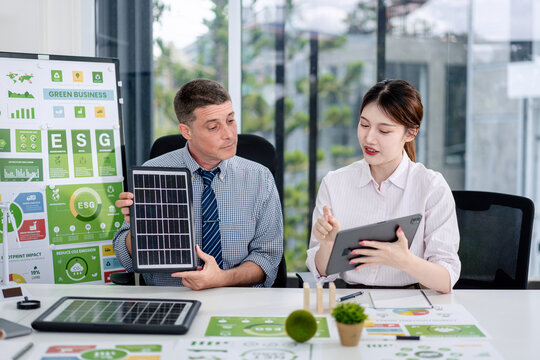 Green Business ESG Strategy Meeting Discussing Renewable Energy