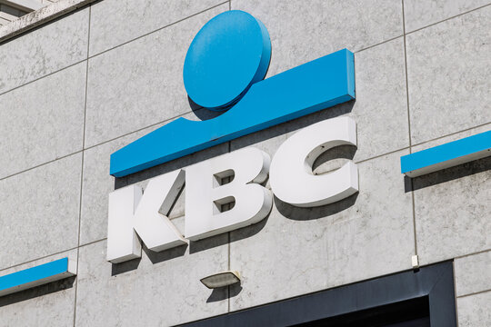 Antwerp, Belgium - 06 September 2026: KBC bank corporate logo displayed on the exterior facade of the headquarters building in the city.