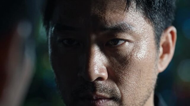 Ultra-realistic close-up of a character in a large-scale cinematic scene, with the face filling much of the frame while a monumental environment remains softly blurred in the background.